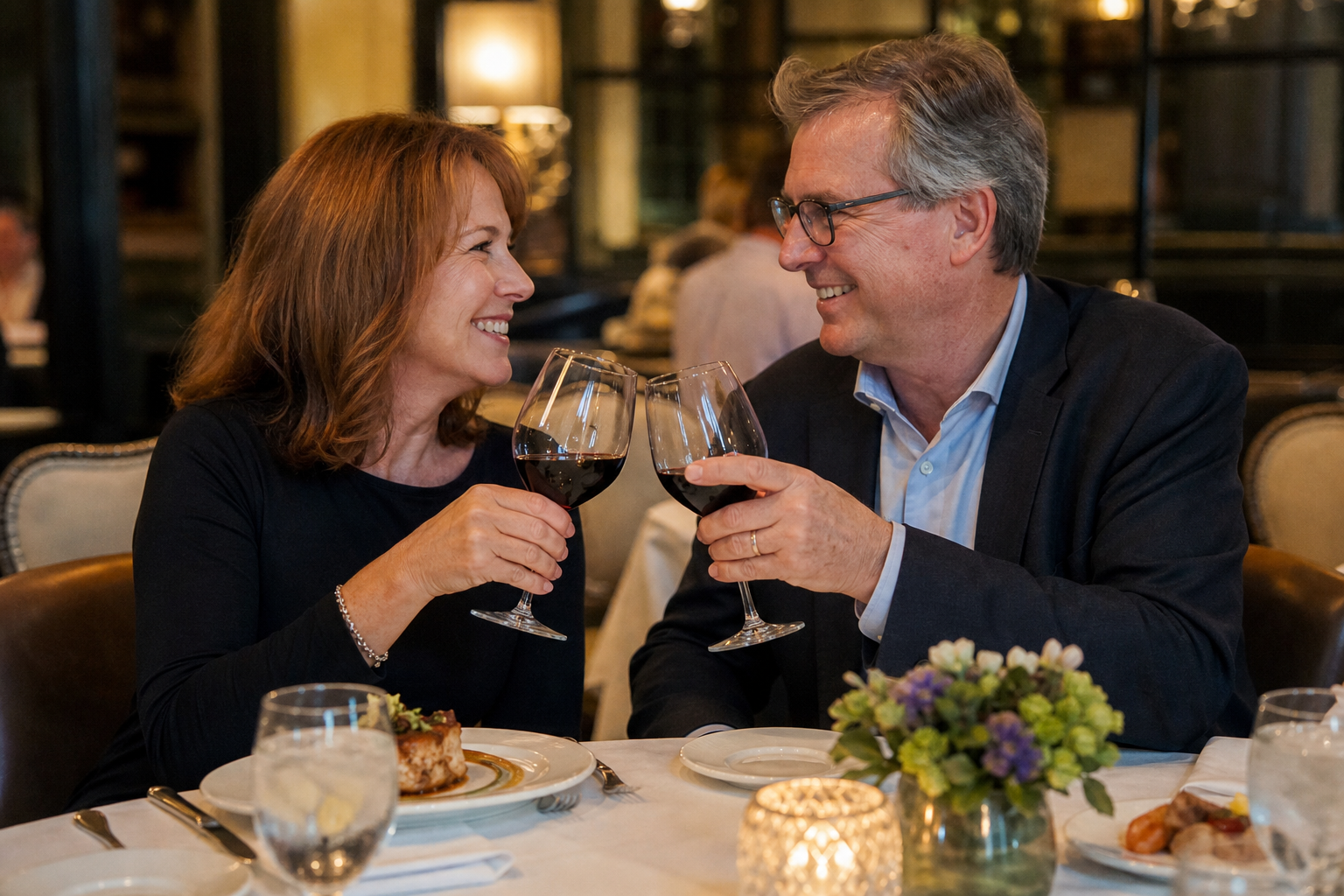 Restaurant guests toasting at the table